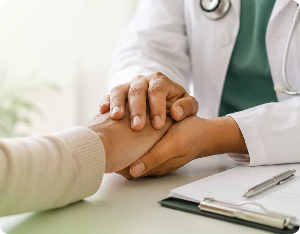 Healthcare professional supporting a patient